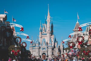 Cinderella Castle at Disney World's Magic Kingdom adorned for holiday festivities, Orlando, Florida.